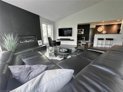 8-141 Welland Vale Road, St. Catharines, ON - Indoor Photo Showing Living Room With Fireplace