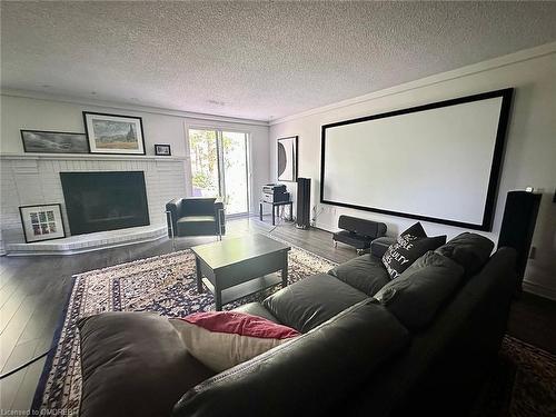 8-141 Welland Vale Road, St. Catharines, ON - Indoor Photo Showing Living Room With Fireplace