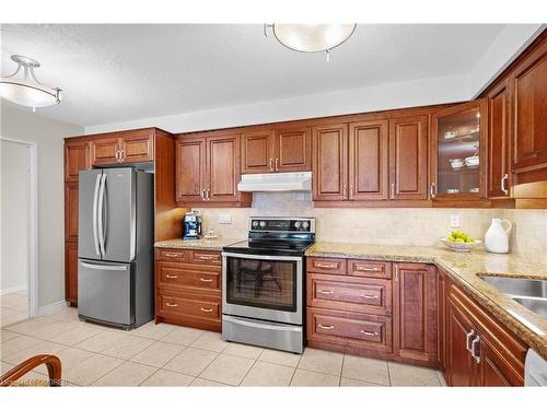 1402-2185 Marine Drive, Oakville, ON - Indoor Photo Showing Kitchen With Double Sink