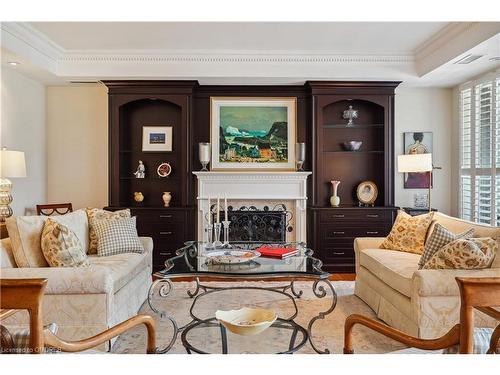 304-68 Yorkville Avenue, Toronto, ON - Indoor Photo Showing Living Room With Fireplace