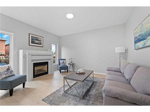 486 Acumen Court, Mississauga, ON - Indoor Photo Showing Living Room With Fireplace