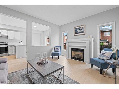 486 Acumen Court, Mississauga, ON - Indoor Photo Showing Living Room With Fireplace