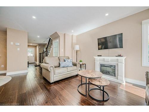 39-2022 Atkinson Drive, Burlington, ON - Indoor Photo Showing Living Room With Fireplace