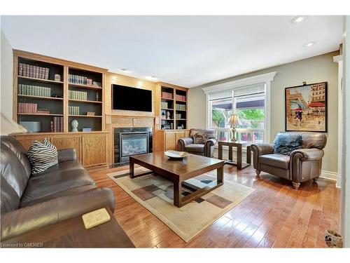 359 River Oaks Boulevard W, Oakville, ON - Indoor Photo Showing Living Room With Fireplace