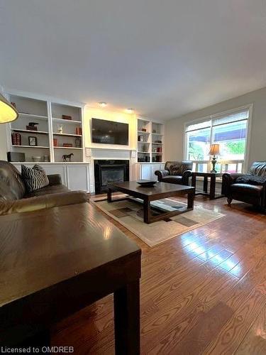 359 River Oaks Boulevard W, Oakville, ON - Indoor Photo Showing Living Room With Fireplace