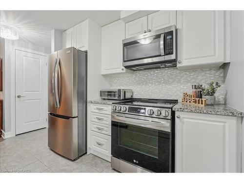 105-2388 Khalsa Gate, Oakville, ON - Indoor Photo Showing Kitchen With Stainless Steel Kitchen With Upgraded Kitchen