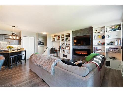 403-188 Mill Street S, Brampton, ON - Indoor Photo Showing Living Room With Fireplace