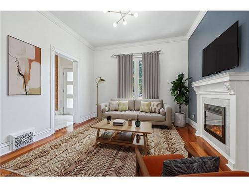 56 Colbourne Street, Hamilton, ON - Indoor Photo Showing Living Room With Fireplace