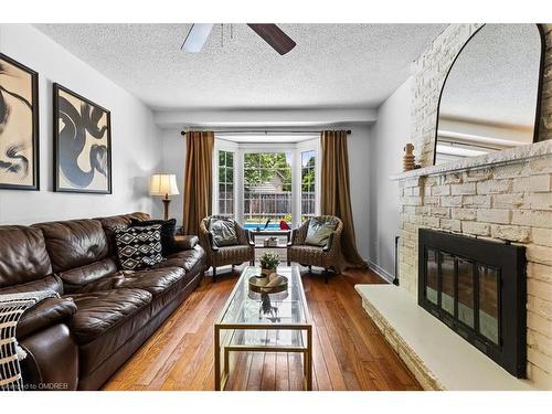 865 Anderson Avenue, Milton, ON - Indoor Photo Showing Living Room With Fireplace