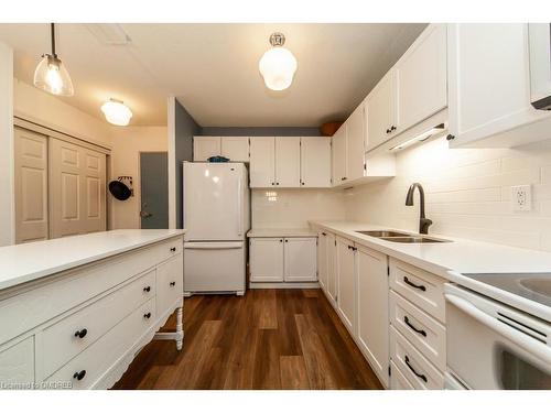 506-81 Millside Drive, Milton, ON - Indoor Photo Showing Kitchen With Double Sink