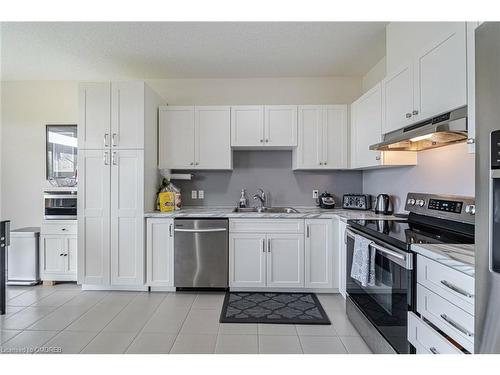 100 Festival Way, Binbrook, ON - Indoor Photo Showing Kitchen With Stainless Steel Kitchen With Double Sink