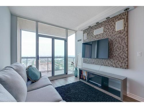 3003-3504 Hurontario Street, Mississauga, ON - Indoor Photo Showing Living Room With Fireplace