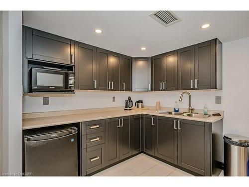 104-1071 Queens Avenue, Oakville, ON - Indoor Photo Showing Kitchen With Double Sink