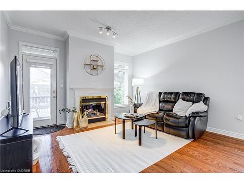 145-2025 Meadowgate Boulevard, London, ON - Indoor Photo Showing Living Room With Fireplace