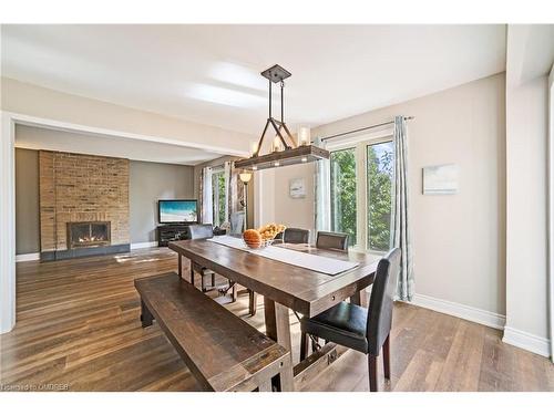 1837 Pilgrims Way, Oakville, ON - Indoor Photo Showing Dining Room With Fireplace