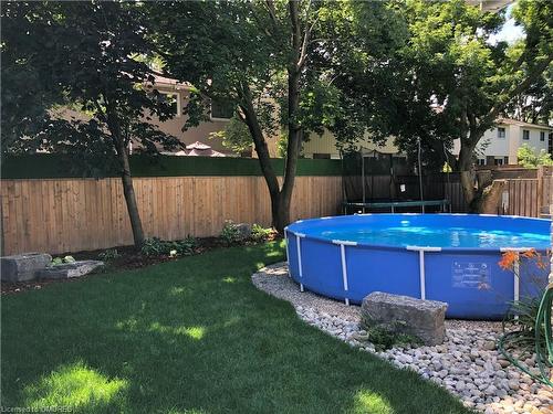 5042 Brady Avenue, Burlington, ON - Outdoor With Above Ground Pool With Backyard