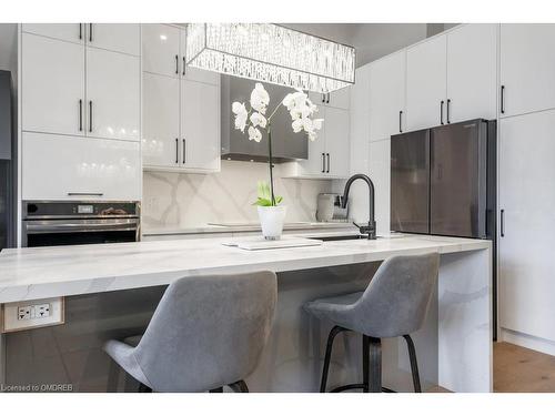 105 Tenth Street, Toronto, ON - Indoor Photo Showing Kitchen With Upgraded Kitchen