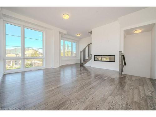 1-2273 Turnberry Road, Burlington, ON - Indoor Photo Showing Other Room With Fireplace