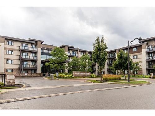 313-128 Garden Drive, Oakville, ON - Outdoor With Facade