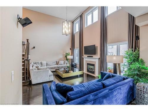 3198 Saltaire Crescent, Oakville, ON - Indoor Photo Showing Living Room With Fireplace