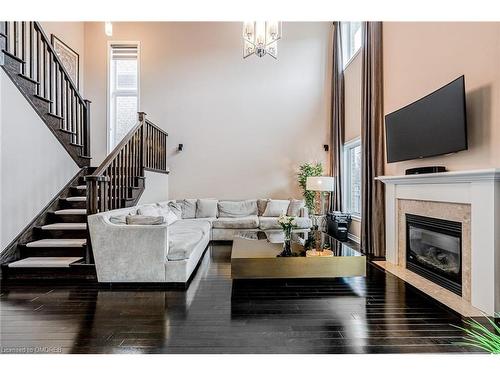 3198 Saltaire Crescent, Oakville, ON - Indoor Photo Showing Living Room With Fireplace