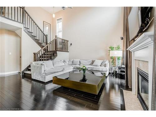 3198 Saltaire Crescent, Oakville, ON - Indoor Photo Showing Living Room With Fireplace