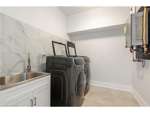 20 Tasker Street, St. Catharines, ON - Indoor Photo Showing Laundry Room