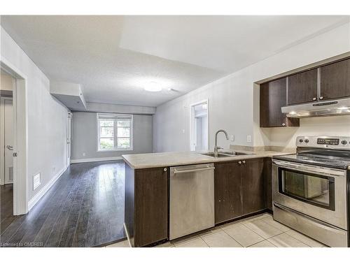 103-3070 Rotary Way, Burlington, ON - Indoor Photo Showing Kitchen With Double Sink