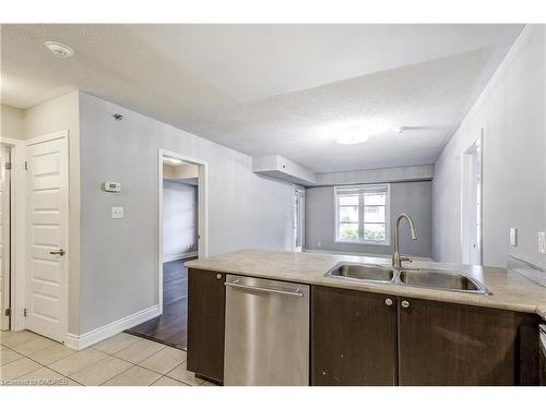 103-3070 Rotary Way, Burlington, ON - Indoor Photo Showing Kitchen With Double Sink