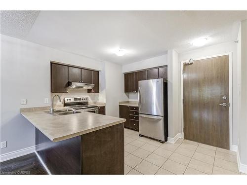 103-3070 Rotary Way, Burlington, ON - Indoor Photo Showing Kitchen With Double Sink