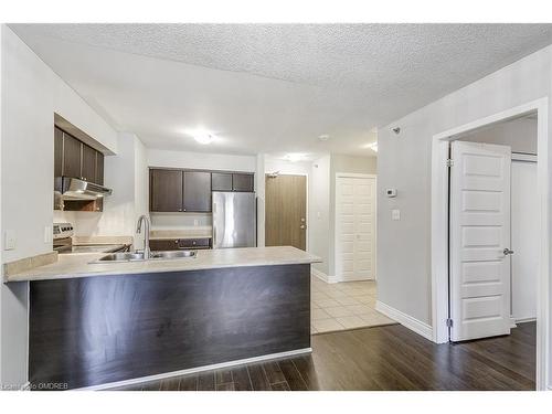 103-3070 Rotary Way, Burlington, ON - Indoor Photo Showing Kitchen With Double Sink