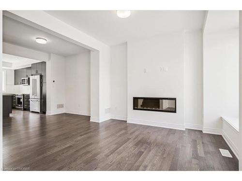 59-2273 Turnberry Road, Burlington, ON - Indoor Photo Showing Living Room With Fireplace