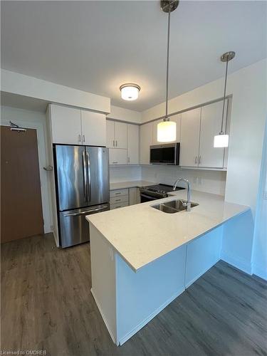 329-128 Grovewood Common, Oakville, ON - Indoor Photo Showing Kitchen With Stainless Steel Kitchen With Double Sink