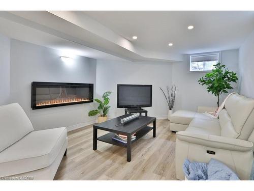 2304 Sovereign Street, Oakville, ON - Indoor Photo Showing Living Room With Fireplace