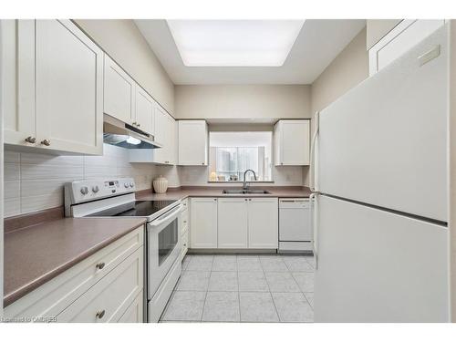 2115-100 Burloak Drive, Burlington, ON - Indoor Photo Showing Kitchen With Double Sink