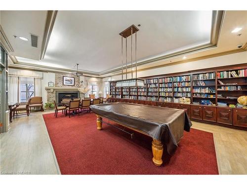 2115-100 Burloak Drive, Burlington, ON - Indoor Photo Showing Other Room With Fireplace