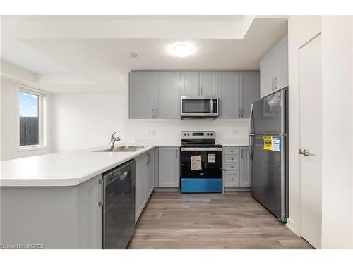 204-160 Densmore Road, Cobourg, ON - Indoor Photo Showing Kitchen With Double Sink