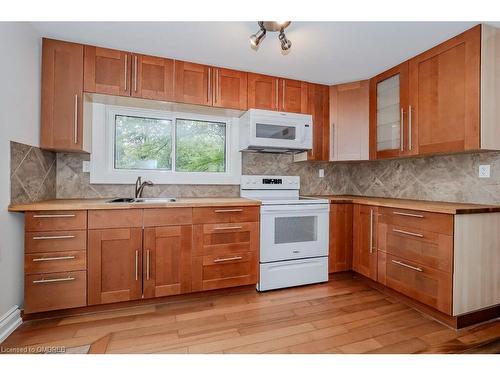 86 Woodward Street, Bracebridge, ON - Indoor Photo Showing Kitchen With Double Sink