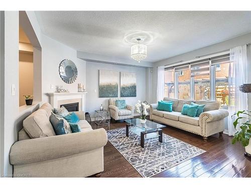 652 Mockridge Terrace, Milton, ON - Indoor Photo Showing Living Room With Fireplace