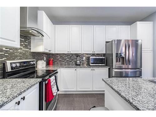 652 Mockridge Terrace, Milton, ON - Indoor Photo Showing Kitchen With Upgraded Kitchen