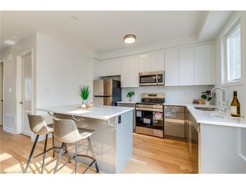 3044 Bramall Gardens, Oakville, ON - Indoor Photo Showing Kitchen With Stainless Steel Kitchen With Upgraded Kitchen