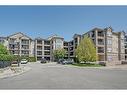 413-2055 Appleby Line, Burlington, ON  - Outdoor With Balcony With Facade 