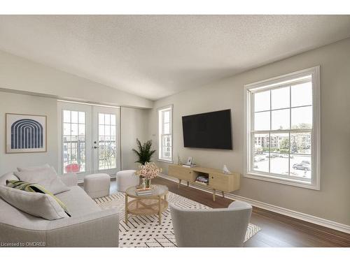 413-2055 Appleby Line, Burlington, ON - Indoor Photo Showing Living Room