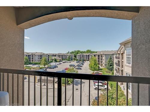 413-2055 Appleby Line, Burlington, ON - Outdoor With Balcony