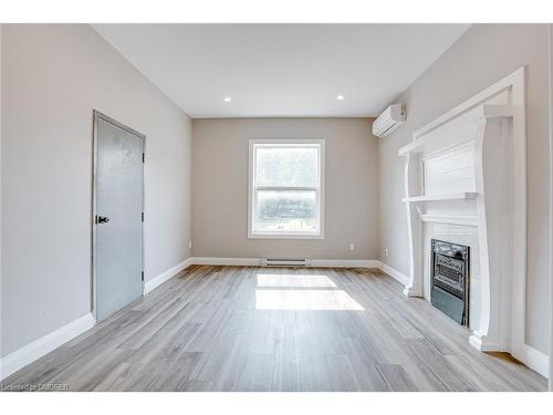 1-64 Wellington Street S, Hamilton, ON - Indoor Photo Showing Other Room With Fireplace