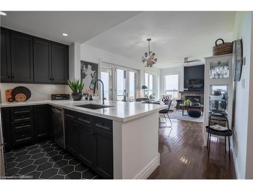 556 Mariners Way, Collingwood, ON - Indoor Photo Showing Kitchen With Fireplace