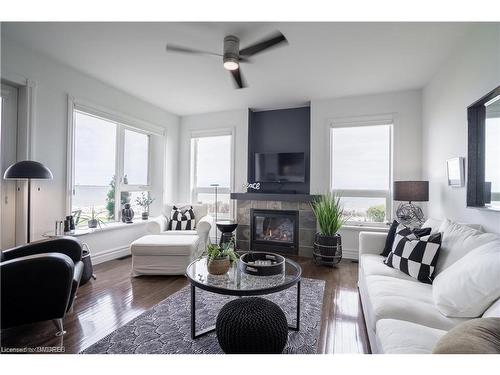 556 Mariners Way, Collingwood, ON - Indoor Photo Showing Living Room With Fireplace