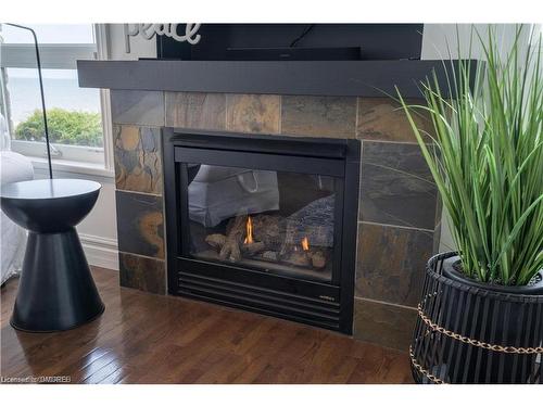 556 Mariners Way, Collingwood, ON - Indoor Photo Showing Living Room With Fireplace