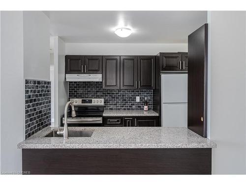 512-4185 Shipp Drive, Mississauga, ON - Indoor Photo Showing Kitchen