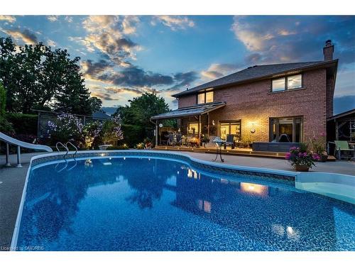 1121 Manor Road, Oakville, ON - Outdoor With In Ground Pool With Deck Patio Veranda With Backyard